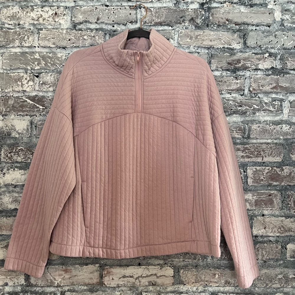 Pretty light pink 1/4 zip sweatshirt with front pocket all the way through Cutee